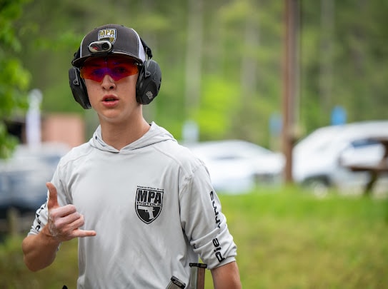 Tripp Wilson in MPA gear match-ready at an outdoor shooting event
